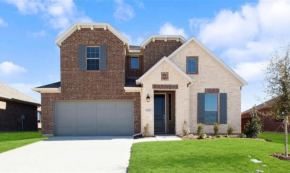 Brick and stone front of 1125 Almond Drive in Forney