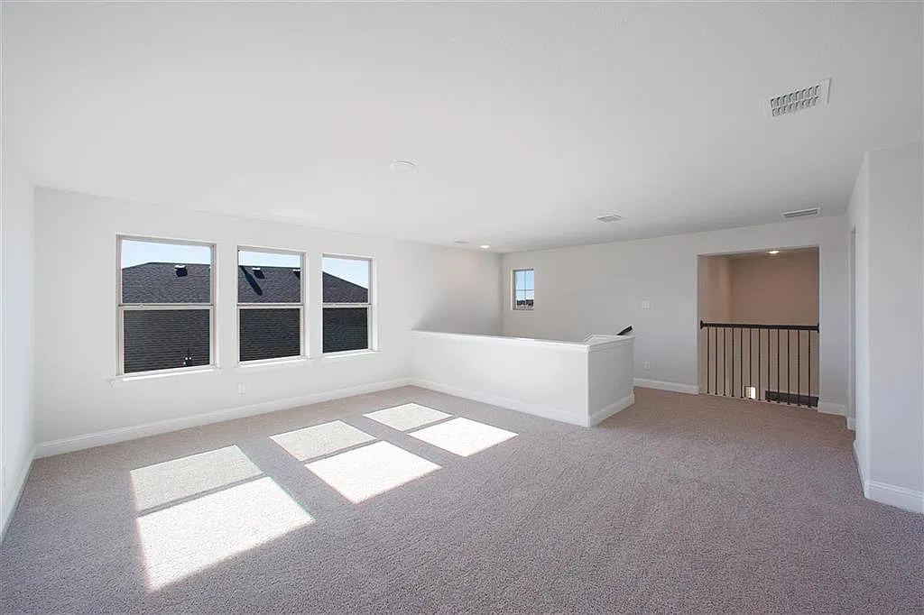 Large carpeted upstairs game room